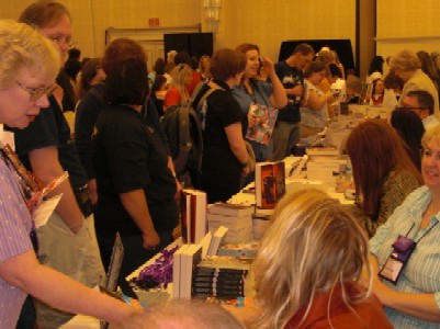 readers at signing table